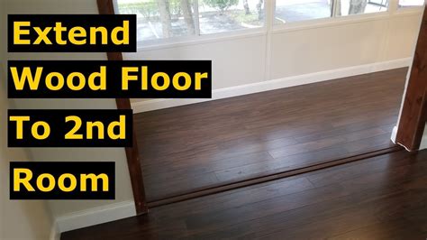 connecting rooms with laminate flooring